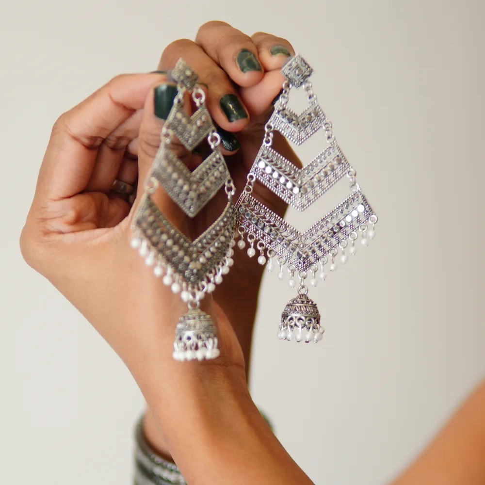 Side view of multi-layer earrings for women – elegant statement jewelry