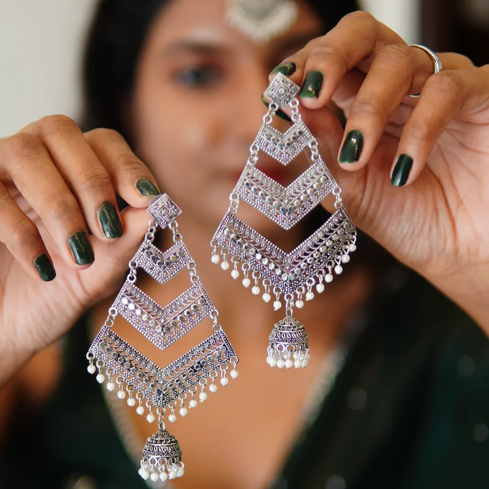 Close-up of multi-layer earrings for women showing intricate design