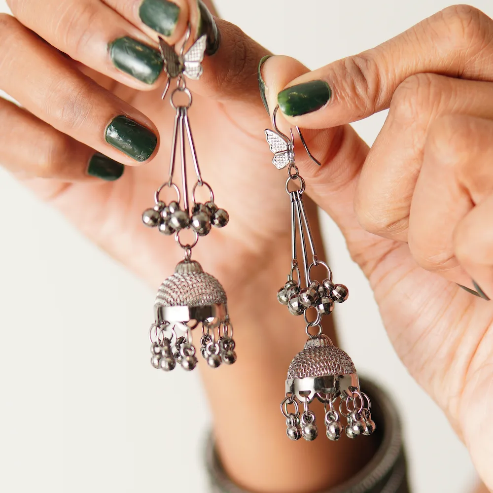 Side view of butterfly design drop earrings for ethnic and party wear