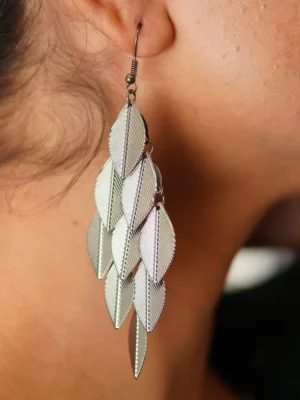 Close-up of oxidized leaf drop earrings showing intricate boho design