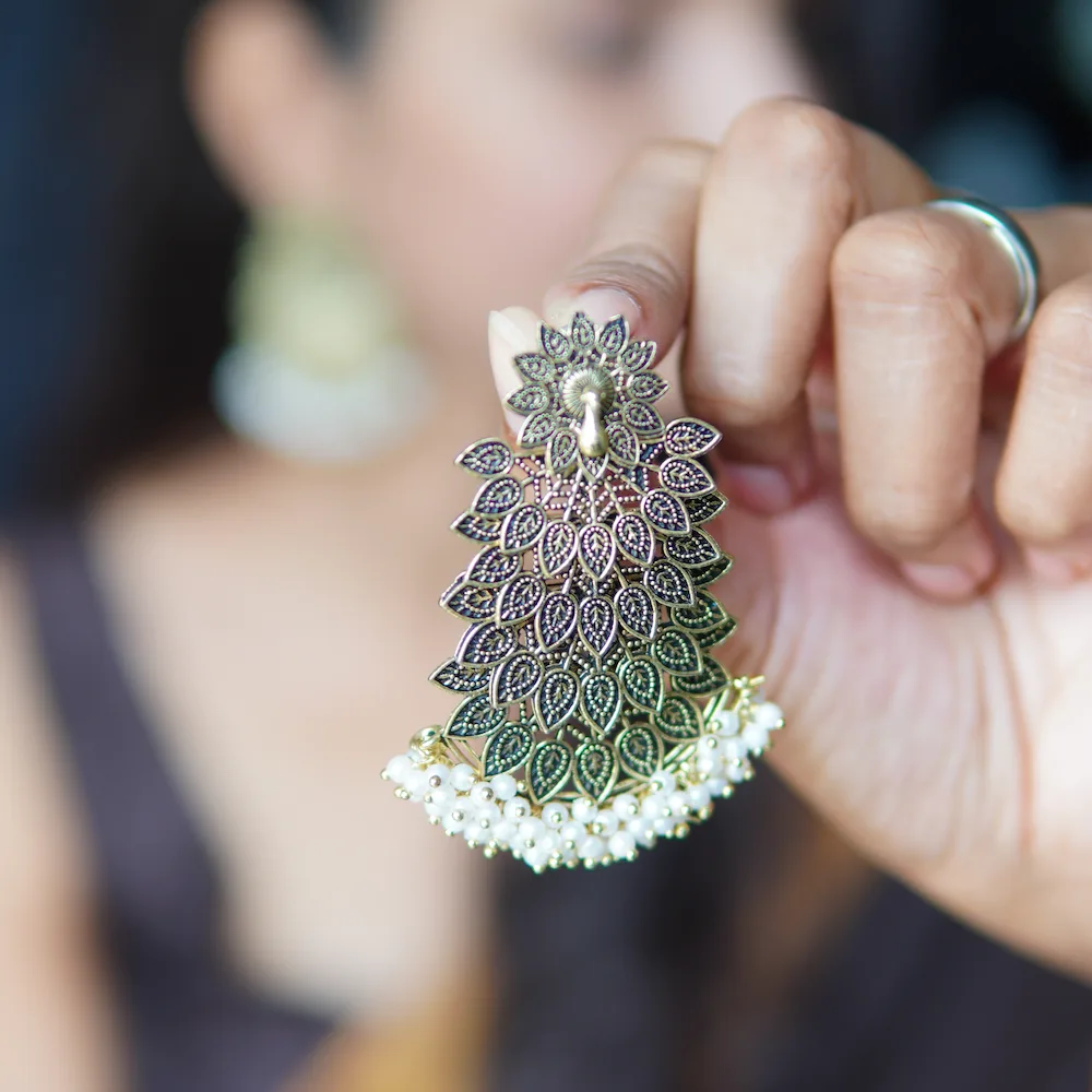 Handcrafted brass look peacock design earring