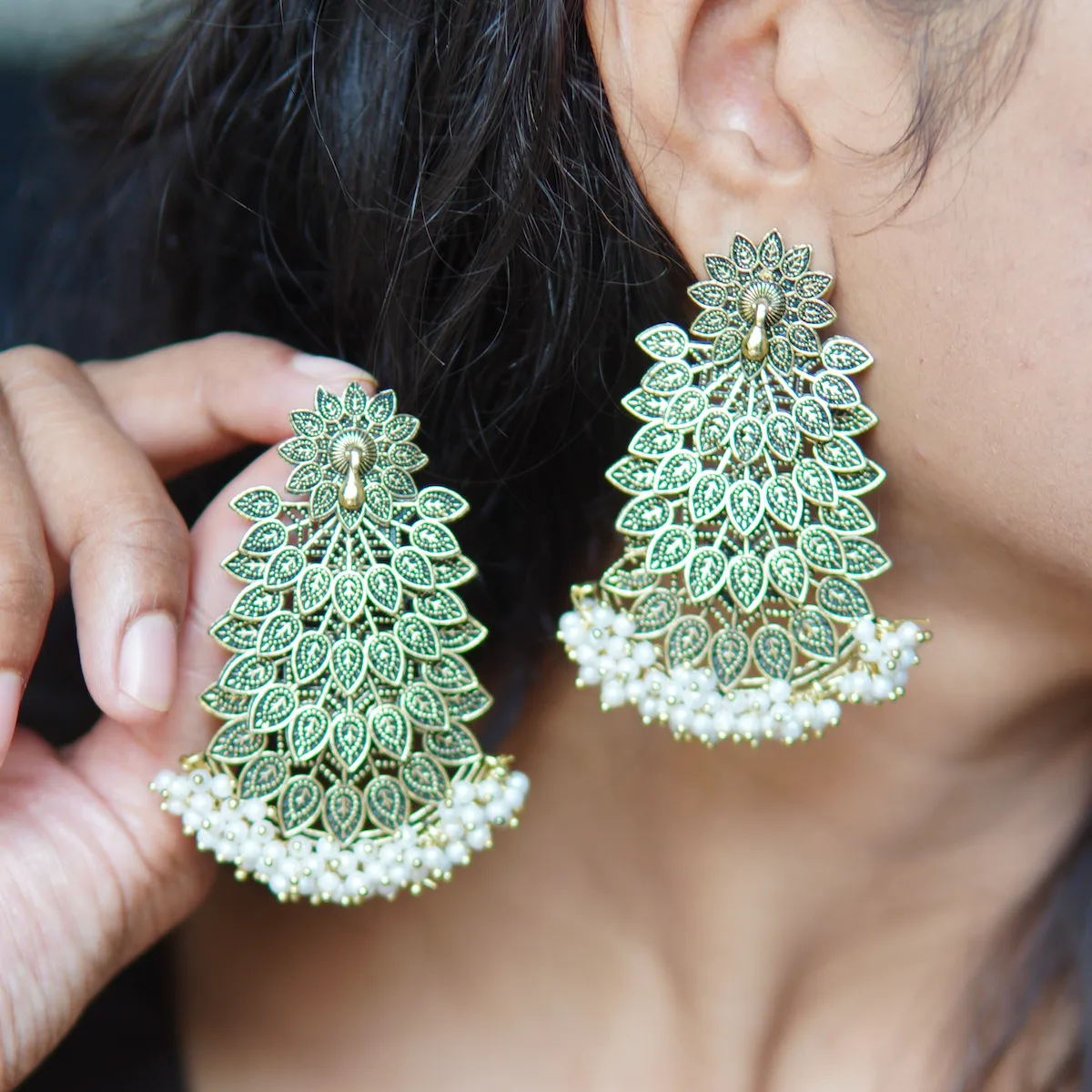 Brass Look Peacock Earring styled with Indian attire