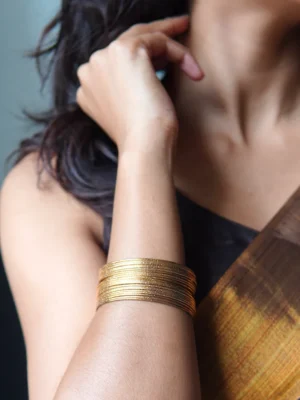 Golden stylish bangle for women by Huviena